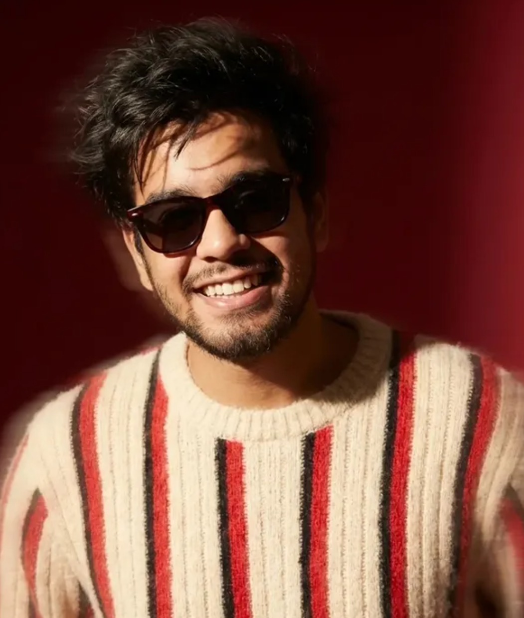 Man in Striped Sweater Vogue Motion Blur Portrait - AI Prompt